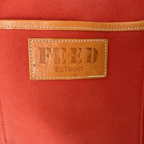 Limited Edition Shinola + FEED Sunset Orange Canvas Tote with Tan Leather Trim - Picture 2 of 11